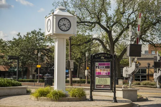 white clock tower at railroad crossing in Elmhurst Illinois