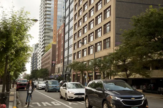 Divvy Bike and cars sharing the road on South Clark Street in Printer's Row Chicago