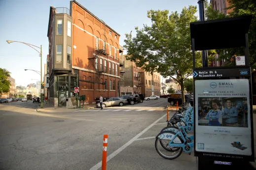 Divvy Bike rental station on street corner in Noble Square Chicago