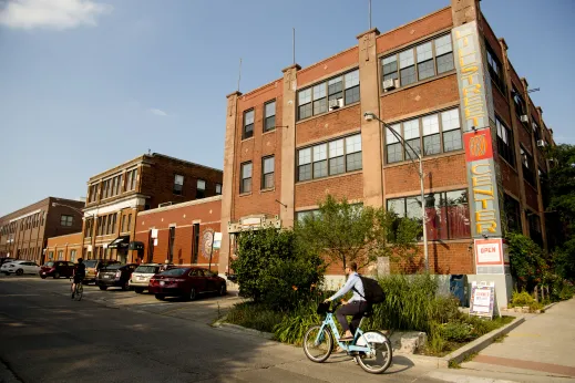 Divvy Bike rider at Lill Street Art Center in Ravenswood Chicago