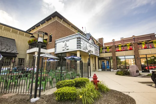 outdoor patio cafe with lots of flowers, sidewalk and fire hydrant in Palatine, Illinois