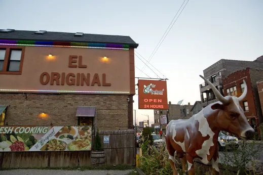 El Original Tacos restaurant and cow statue on Near West Side Chicago
