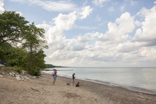 family on beach along Lake Michigan in Highland Park, IL