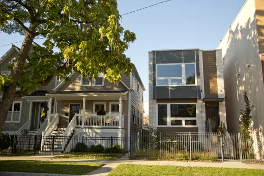 new modern home next to two older Chicago homes in Bowmanville Chicago