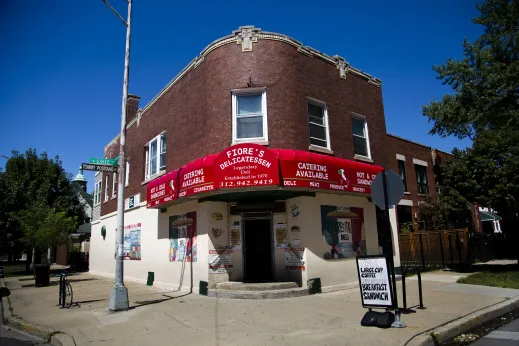Fiores Delicatessen red sign and front entrance on W Erie St in Ukrainian Village