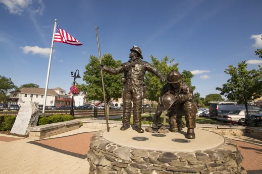 firefighter monument and flag in Palatine, Illinois