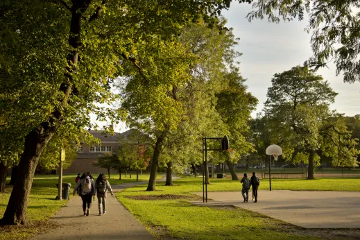 Kids walking in basketball park in Kilbourn Park Chicago