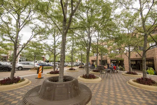 lunch area with tables and cobblestone ground in Highland Park