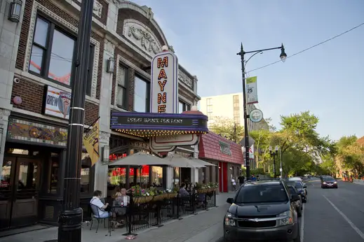 Mayne Stage marquee and outdoor patio seating on W Morse Ave in Chicago