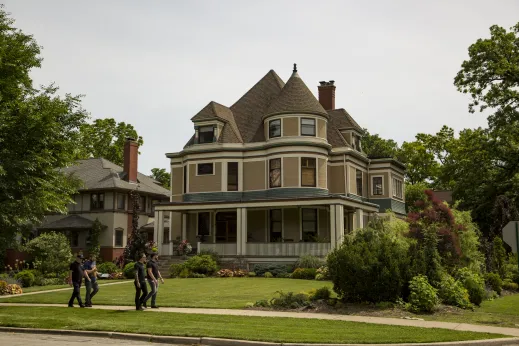 Men walking large home vines Oak Park, IL