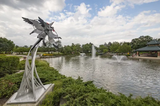 metal statue of birds over large outdoor fountain in Schaumburg, Illinois