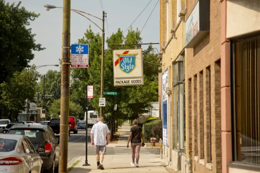 Old Style beer sign on neighborhood pub exterior in Portage Park Chicago