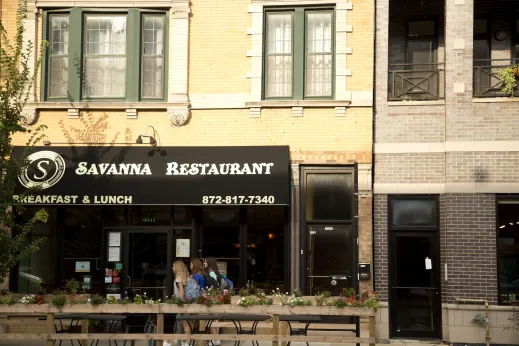 Savanna Restaurant awning and front entrance with outdoor seating on N Lincoln Ave in St. Ben's Chicago