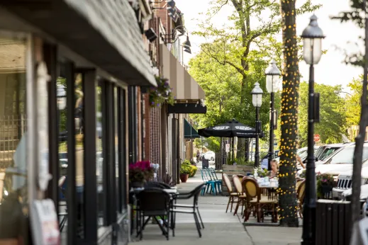 Sidewalk dining woman chairs lights Park Ridge, IL