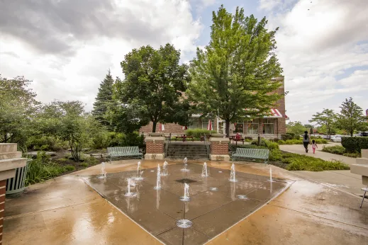 spraying fountains on summer day in downtown Schaumburg, Illinois