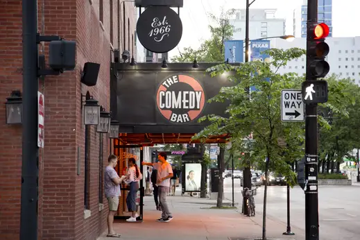 The Comedy bar sign and entrance on N LaSalle St in River North Chicago