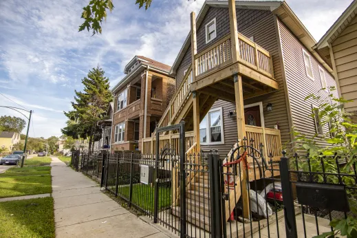 classic Chicago wood stairs on two-flat apartment building in Brighton Park Chicago