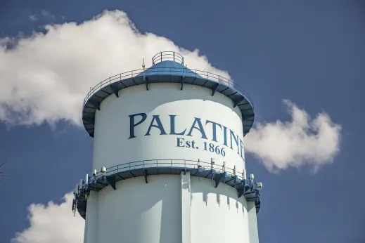 large public water tower with 'palatine' painted on it in Palatine, Illinois