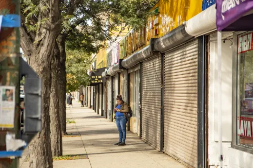 Woman-on-phone-outside-of-closed-store-Gage-Park_gallery(3)