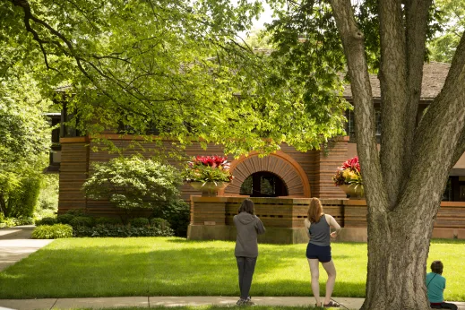 Women standing home lawn flowers Oak Park, IL