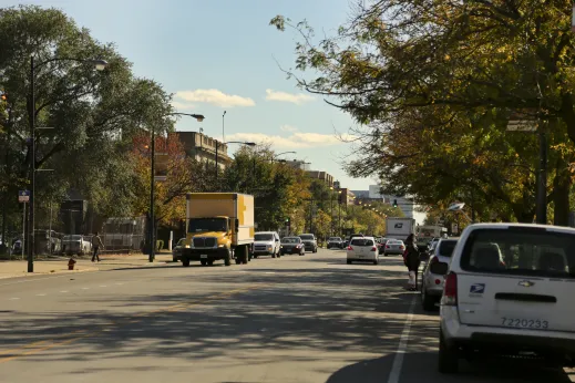 Yellow-truck-traffic-woman-crossing-Kenwood_gallery(1)