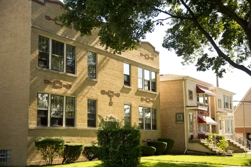 Apartment building exterior and front lawn in Edison Park