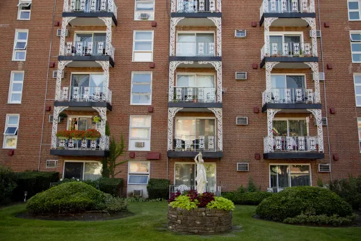 Apartment building with decorative wrought iron balconies in Edison Park