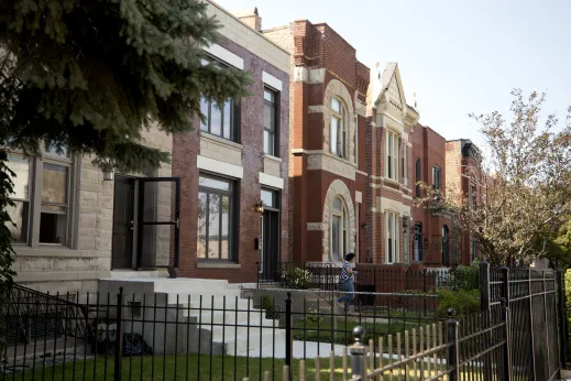 Apartment buildings and front yard fences in Tri-Taylor Chicago