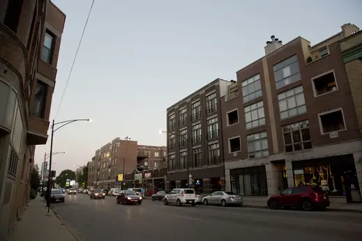 Apartment buildings and ground floor retail on W Irving Park Rd in Graceland West