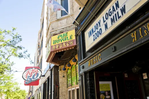 Bars exterior signs on W Division St in Ukrainian Village Chicago