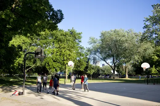 Basetball players at outdoor court in Lincoln Park Chicago