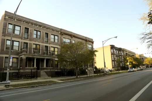 Brick apartments with front balconies near Washington Park Chicago