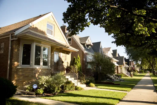 Brick bungalow and single family homes with front lawns in Norwood Park neighborhood