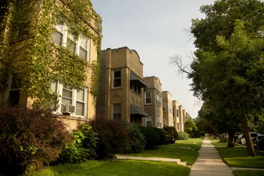 Brick two flat apartment buildings and sidwalk in Hollywood Park