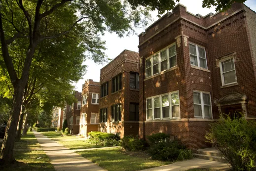 Brick two flat apartment buildings and front yards in Arcadia Terrace Chicago
