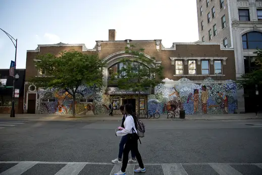 Children walking across from community youth center on N Sheridan Rd in Uptown Chicago