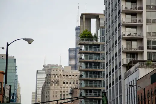 Condo building balconies and Merchandise Mart in River North Chicago