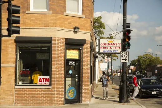 Convenience store on street corner near apartments in Austin Chicago