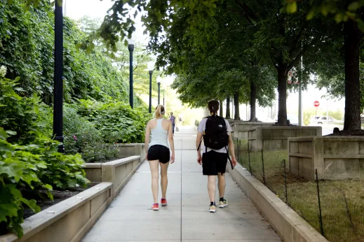 Couple walking in Millennium Park in Lakeshore East Chicago