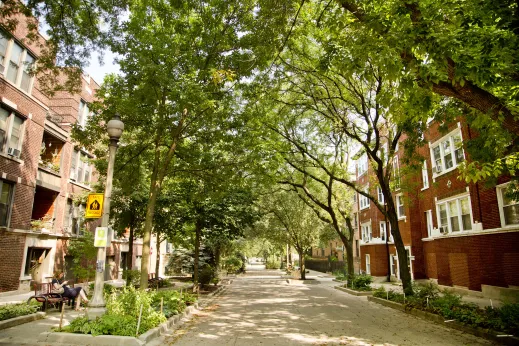 Courtyard with park and benches between apartment buildings in Sheridan Park