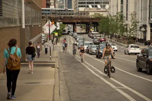 Cyclists in bike lane on N Milwaukee Ave in Fulton Market Chicago
