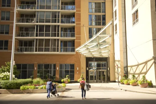 Entrance to an apartment building in Lakeshore East Chicago with balconies