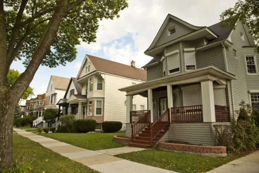 Front lawns of single family homes and apartments in Austin Chicago