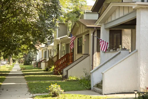 Front porches of single family homes on neighborhood street in Mayfair Chicago