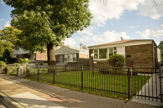 Front yards of single family homes and apartments in Fuller Park Chicago