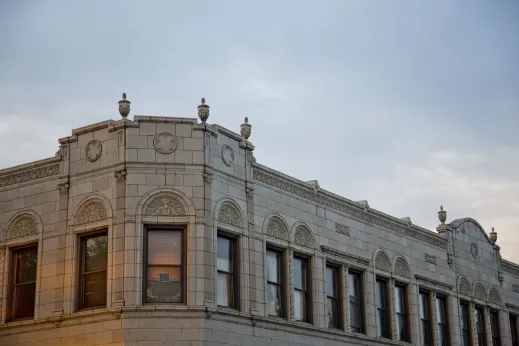 Glazed terra cotta vintage apartment building facade in Albany Park Chicago