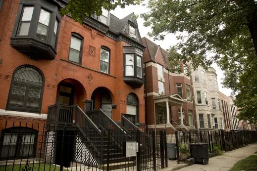 Historic apartment buildings and front yards in Bronzeville Chicago