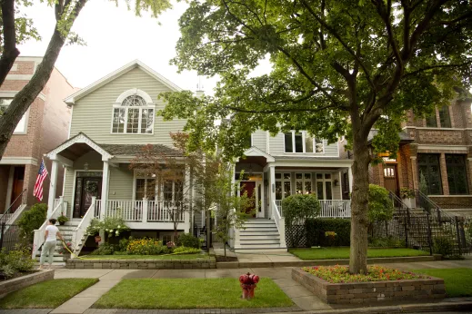 Houses with front porches and gardens in Hamlin Park Chicago