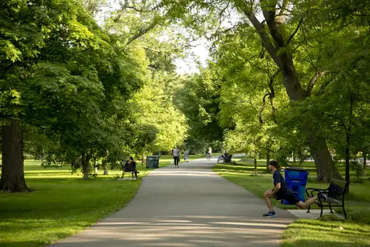 Joggers stretching on running path in Lakeview Chicago