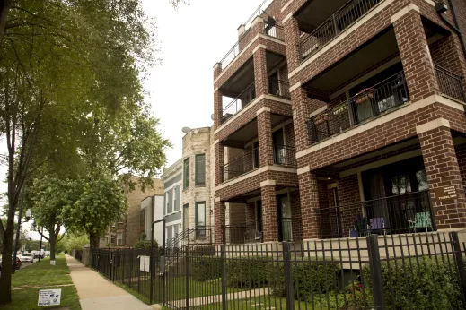 Modern apartment building balconies and front yards in Bronzeville Chicago